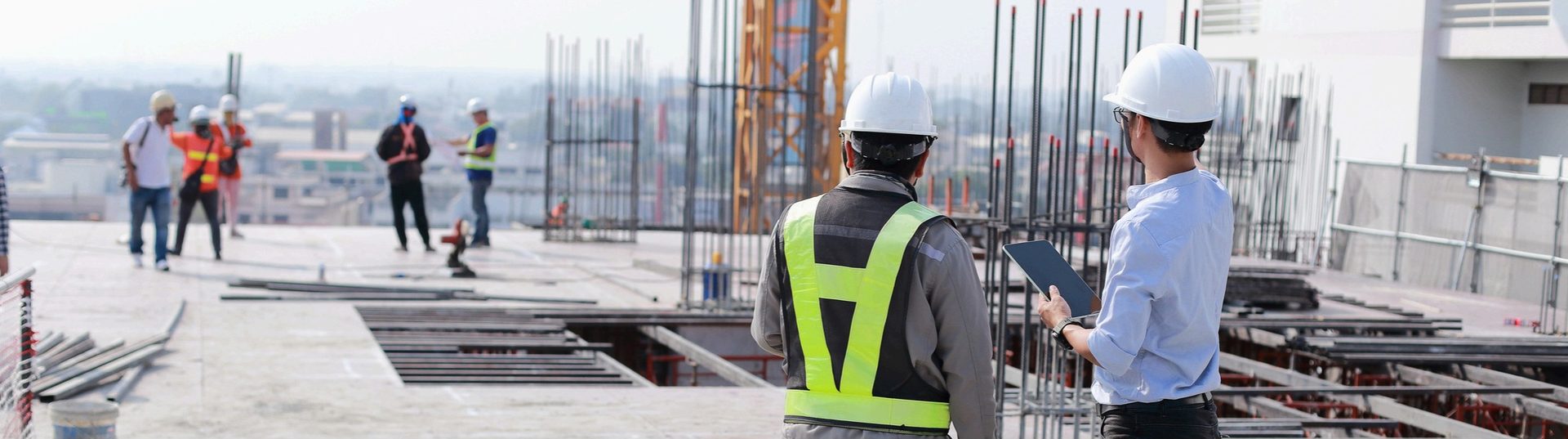 Site engineers reviewing works on a construction project