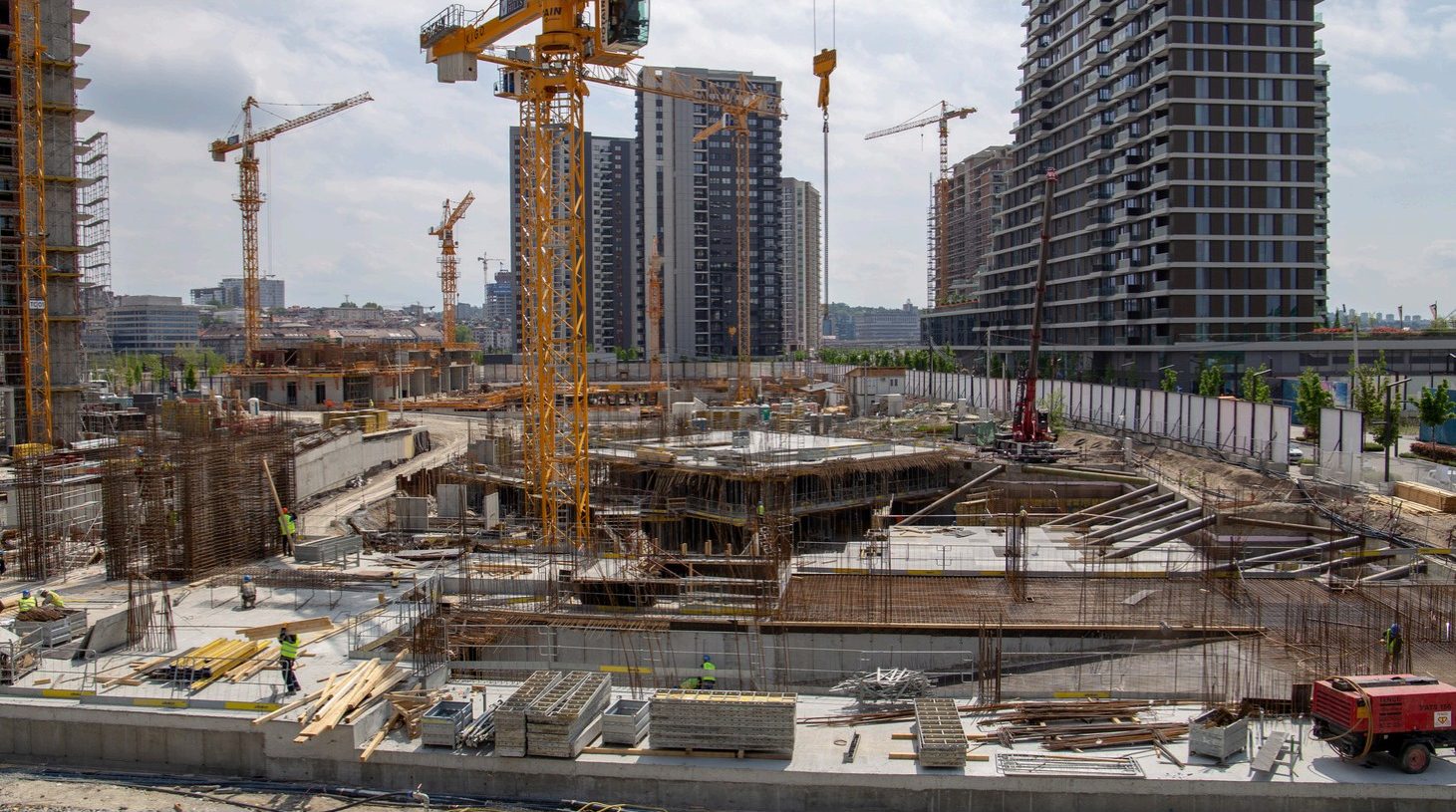 Tower cranes over an active construction site